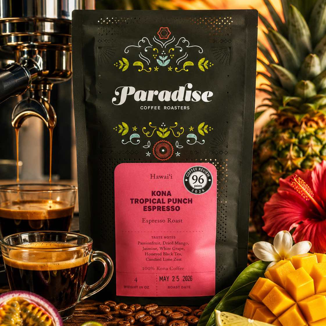 Paradise Coffee Roasters Kona Tropical Punch Espresso bag with coffee cups, fruits, and coffee beans on a wooden surface.